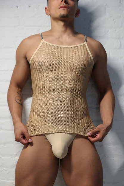Model wearing natural nude netted tank top with metal chain shoulder straps from Fabian Divani Vers collection